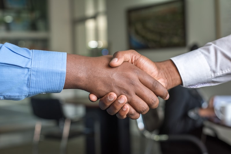Professional handshake representing trust and honest business
