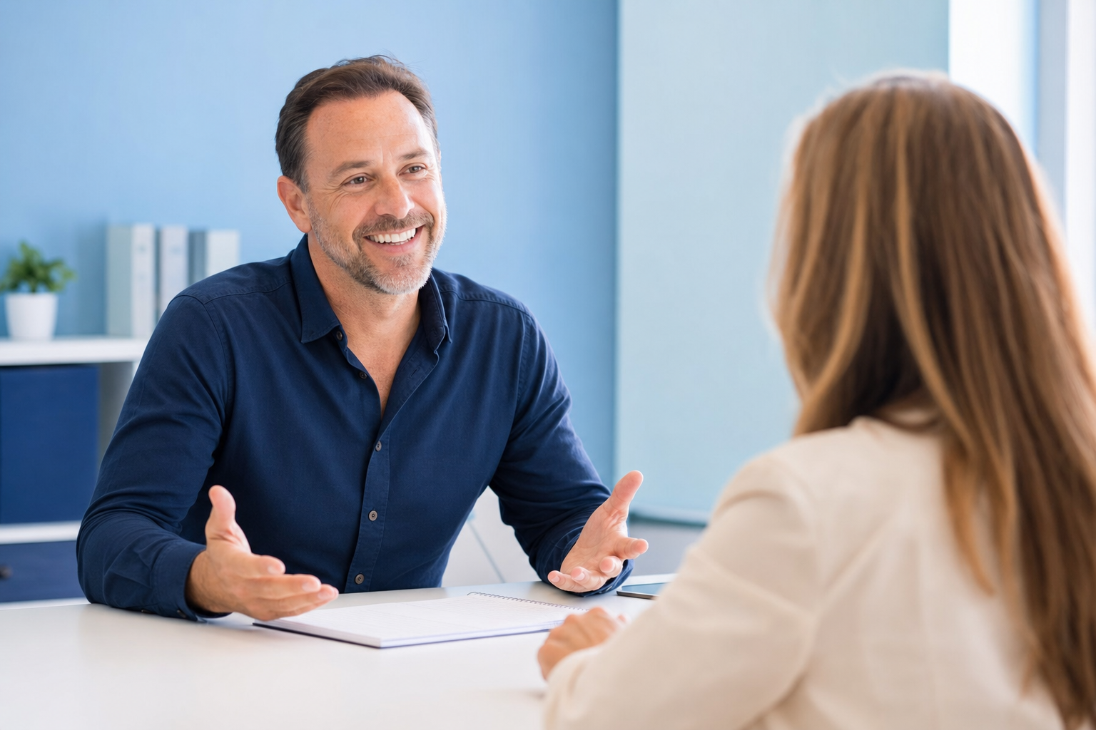 Friendly advisor explaining the note review process