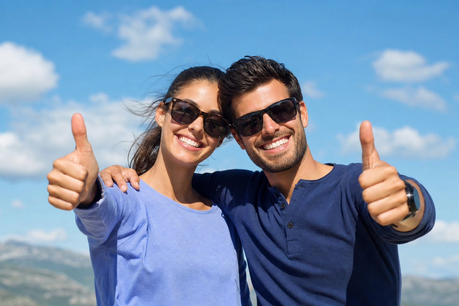 Happy couple giving thumbs up - no cost no obligation